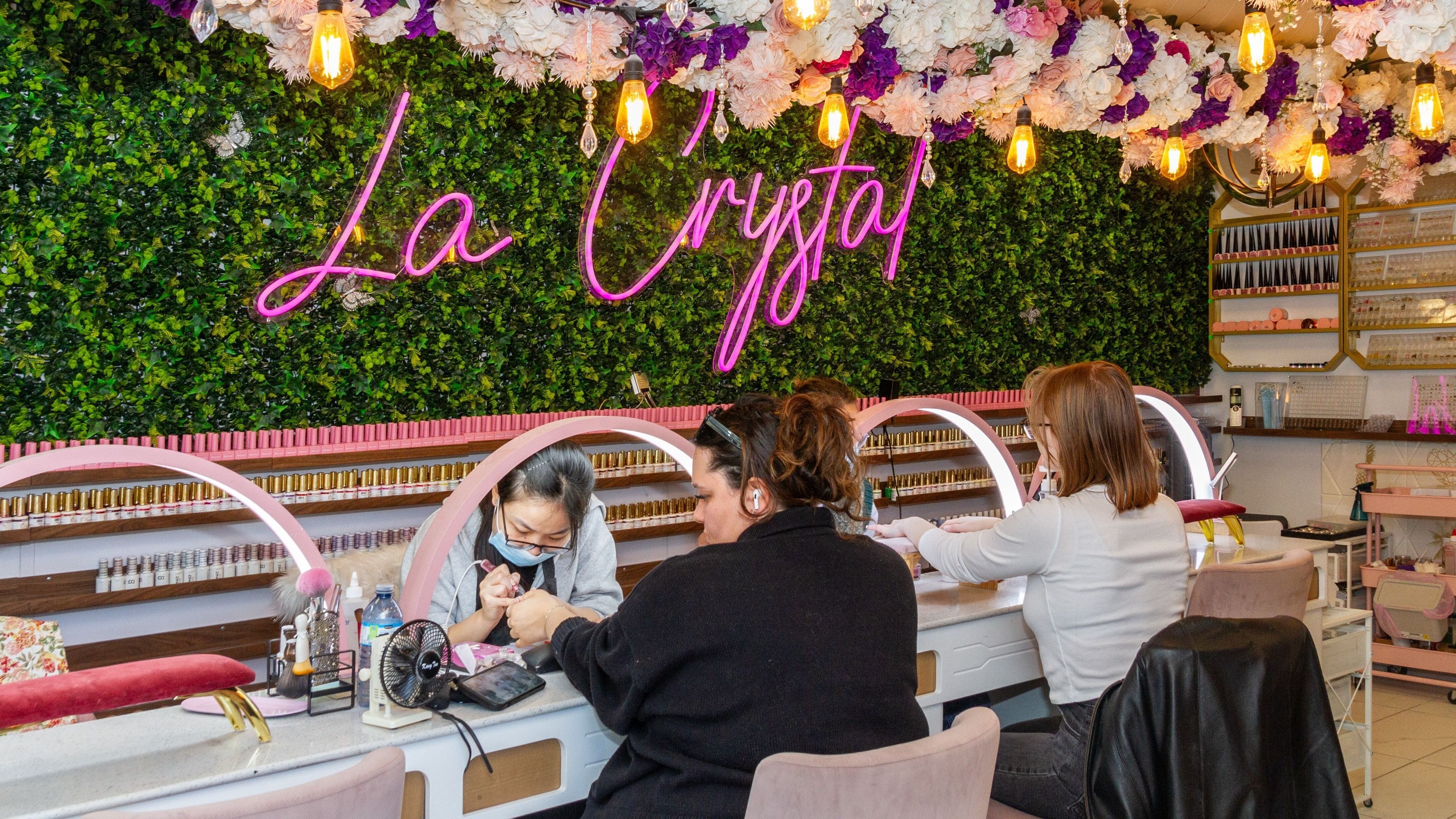 Clients receiving nail treatments at La Crystal Studio - 421 A Cumberland Street, Ottawa, Ontario, CA.