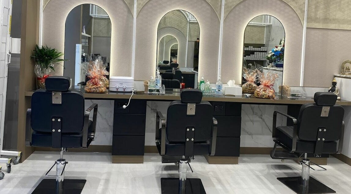 Chic styling area at Indian Beauty Secrets | Emmerton in Emerton, New South Wales, AU featuring modern chairs and mirrors.