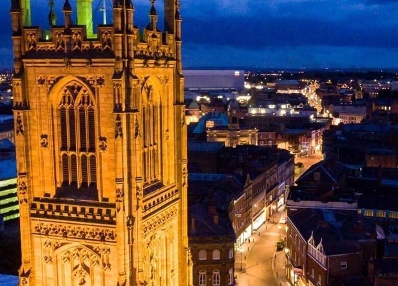 Aerial view of Derby's iconic illuminated tower near Diamond Mobile Massage Derby, Derby, England, GB.