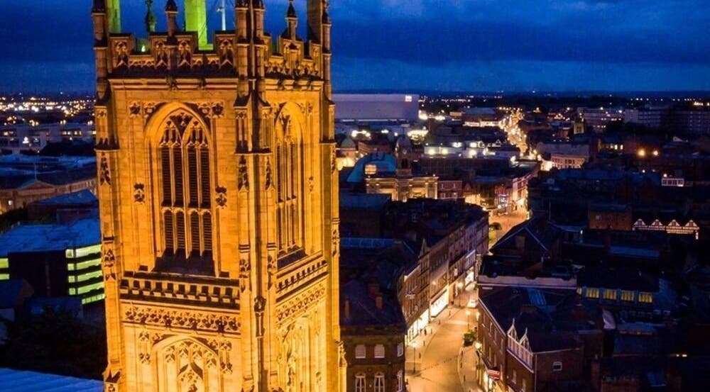 Aerial view of Derby's iconic illuminated tower near Diamond Mobile Massage Derby, Derby, England, GB.