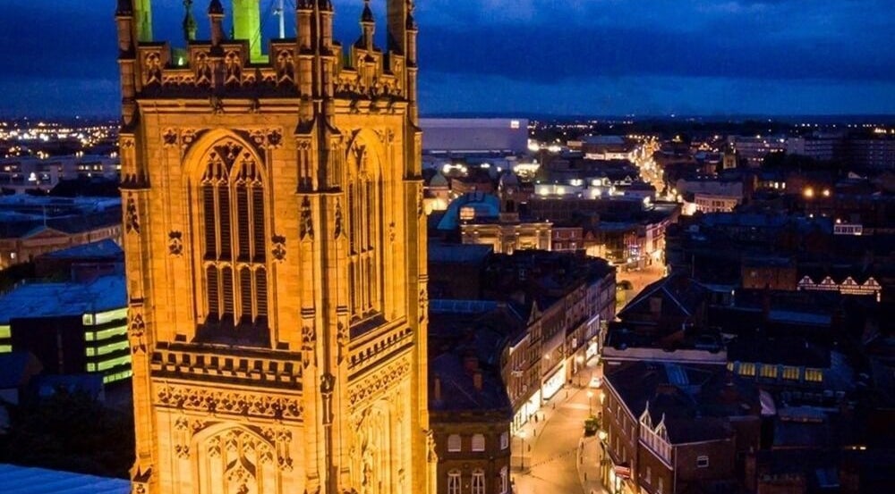 Aerial view of Derby's iconic illuminated tower near Diamond Mobile Massage Derby, Derby, England, GB.