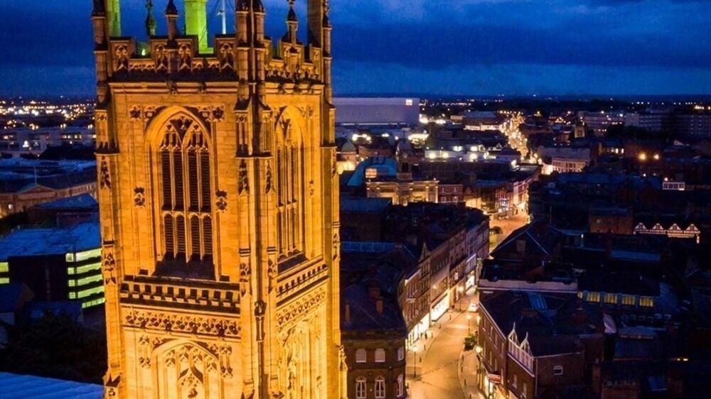 Aerial view of Derby's iconic illuminated tower near Diamond Mobile Massage Derby, Derby, England, GB.