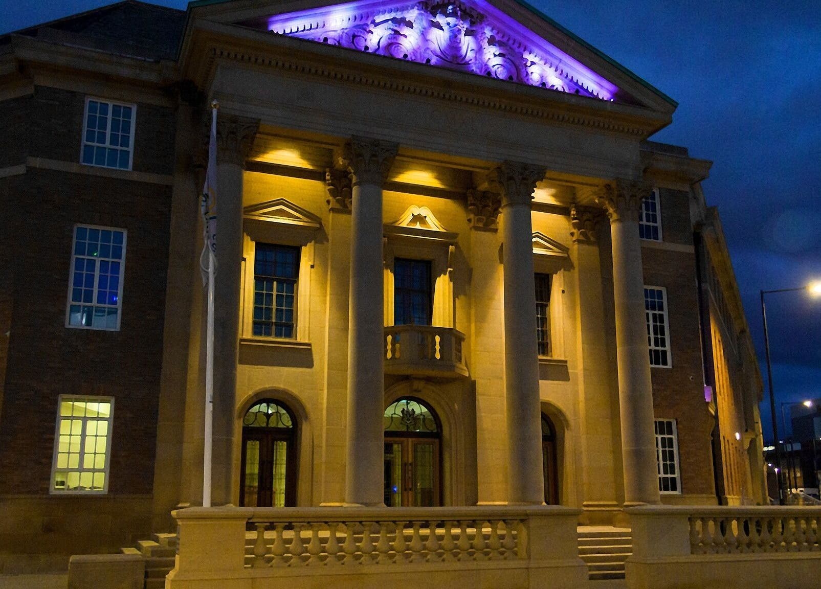 Grand building at night near Diamond Mobile Massage Derby, Derby, England, GB, showcasing elegant architecture.