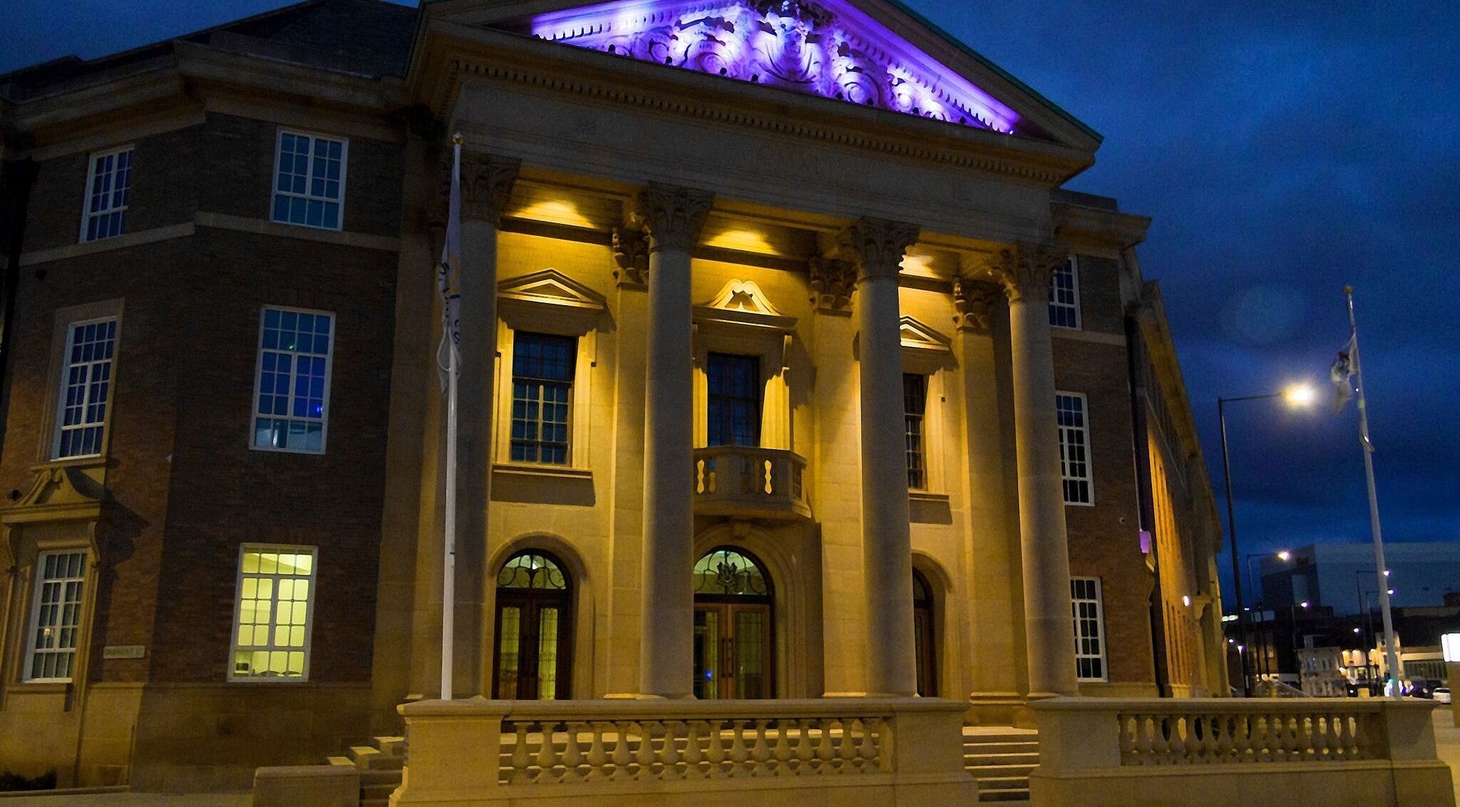 Grand building at night near Diamond Mobile Massage Derby, Derby, England, GB, showcasing elegant architecture.
