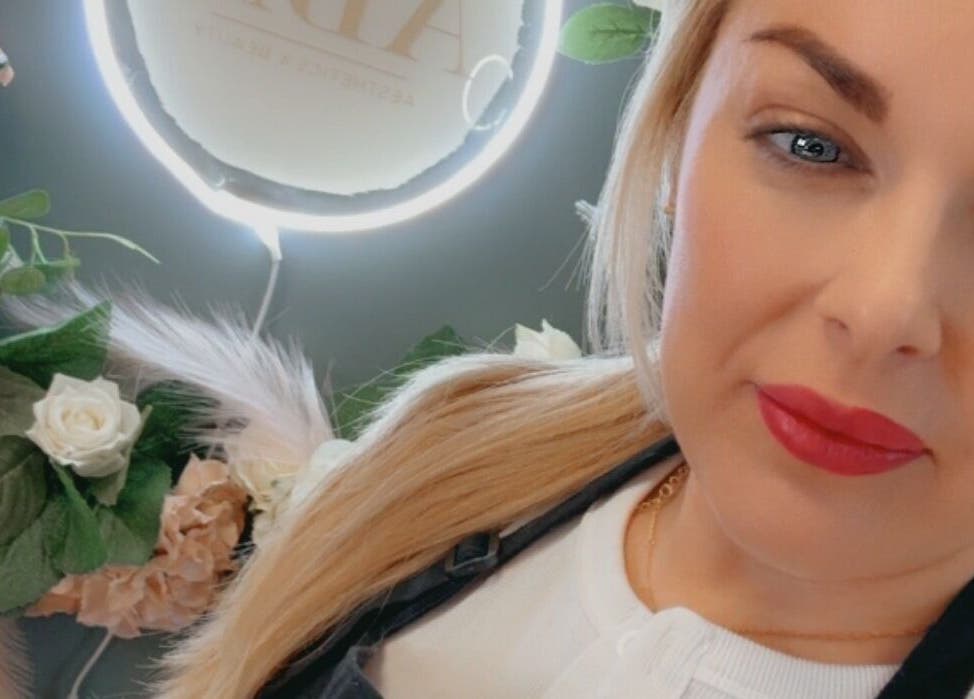 ABM Aesthetics and Beauty in Dunfermline, Scotland, GB, featuring elegant floral decor and welcoming ambiance.