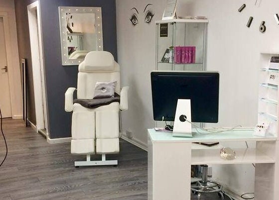 Elegant interior of Diamond Beauty Zone Ltd, Dundee, Scotland, GB showcasing a modern treatment chair and desk.