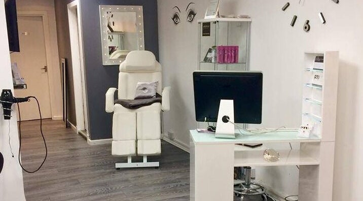 Elegant interior of Diamond Beauty Zone Ltd, Dundee, Scotland, GB showcasing a modern treatment chair and desk.