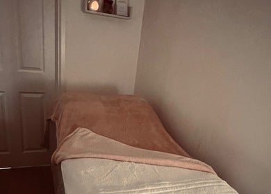 Relaxing massage bed at Hush Hush Beauty, Old Windsor, England, GB, offering a serene escape.