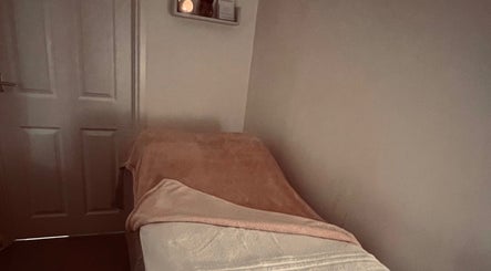 Relaxing massage bed at Hush Hush Beauty, Old Windsor, England, GB, offering a serene escape.