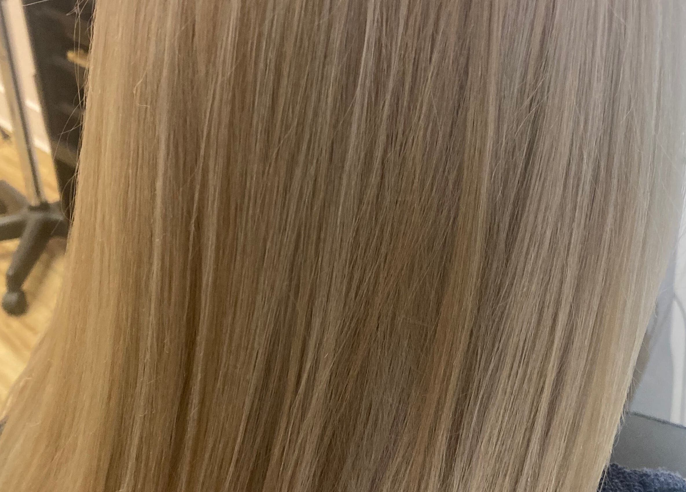 Sleek blonde hair after styling at Luna Del Sol Salon, Osoyoos, British Columbia, CA.