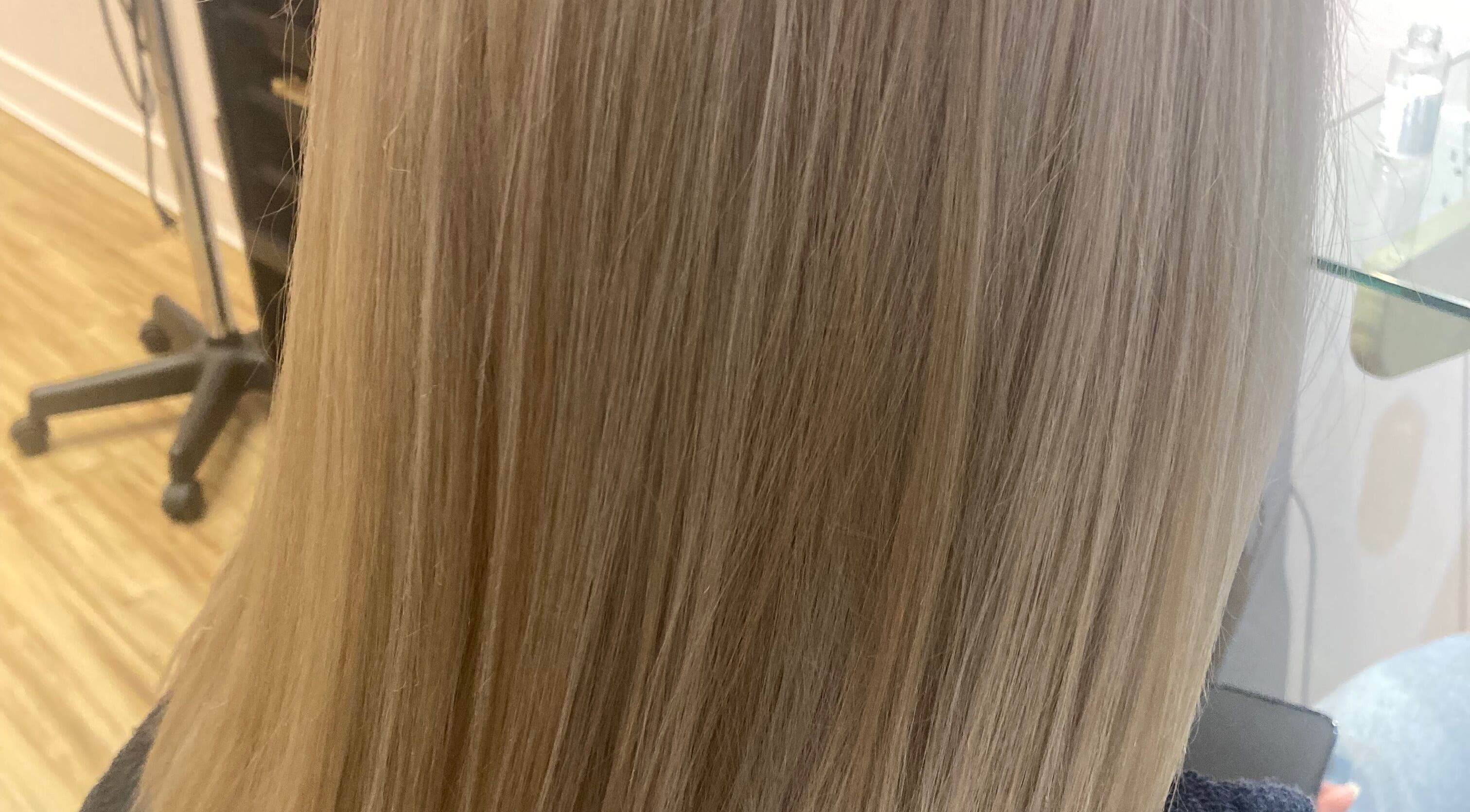 Sleek blonde hair after styling at Luna Del Sol Salon, Osoyoos, British Columbia, CA.