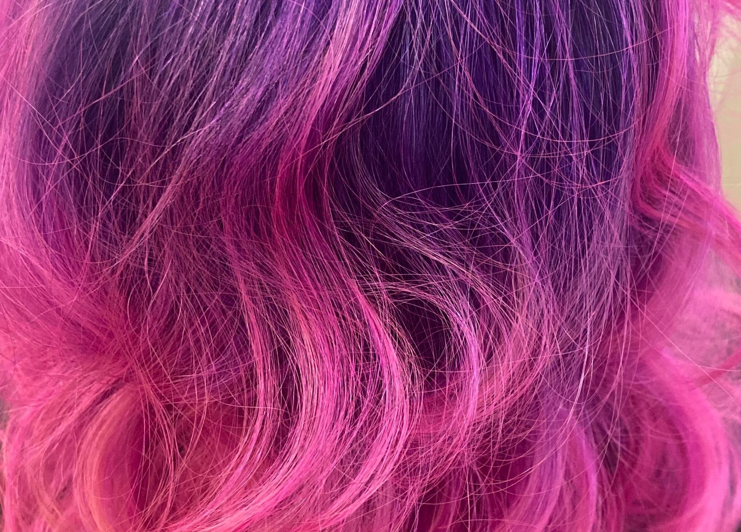 Vibrant pink and purple hair coloring at Luna Del Sol Salon, Osoyoos, British Columbia, CA.