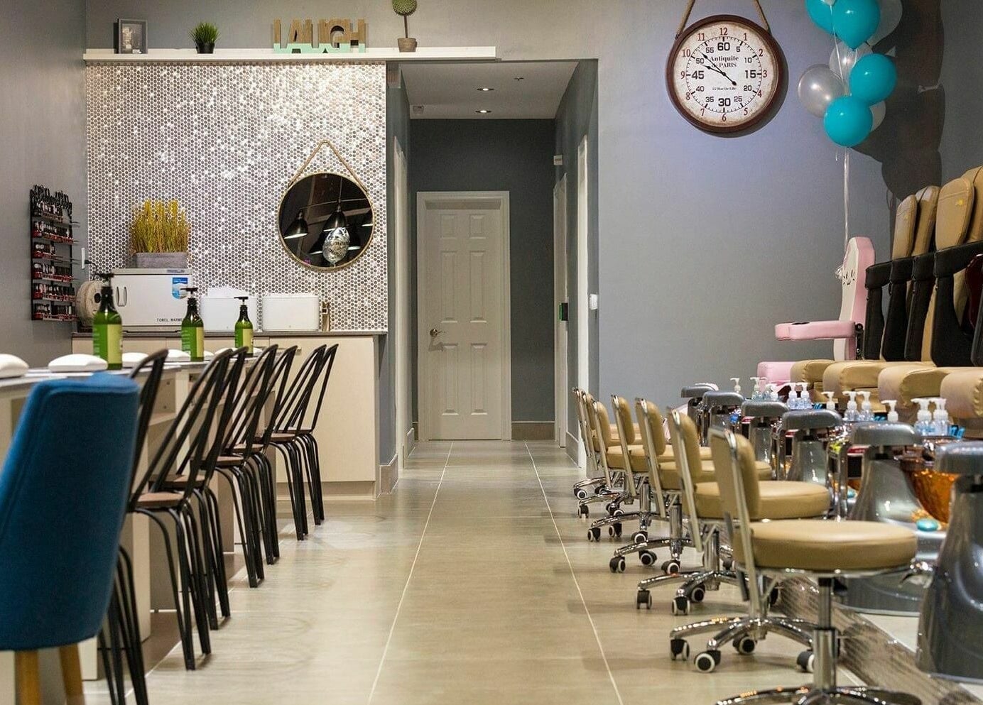 Sophisticated nail salon interior at Glowin’ Nails & Spa, Aurora, Ontario, CA with stylish pedicure stations.