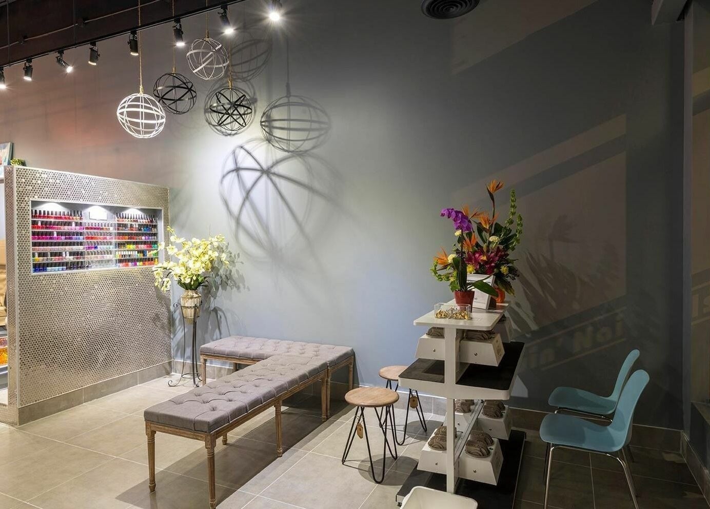 Relaxing interior of Glowin’ Nails & Spa in Aurora, Ontario, CA with plush seating and vibrant decor.