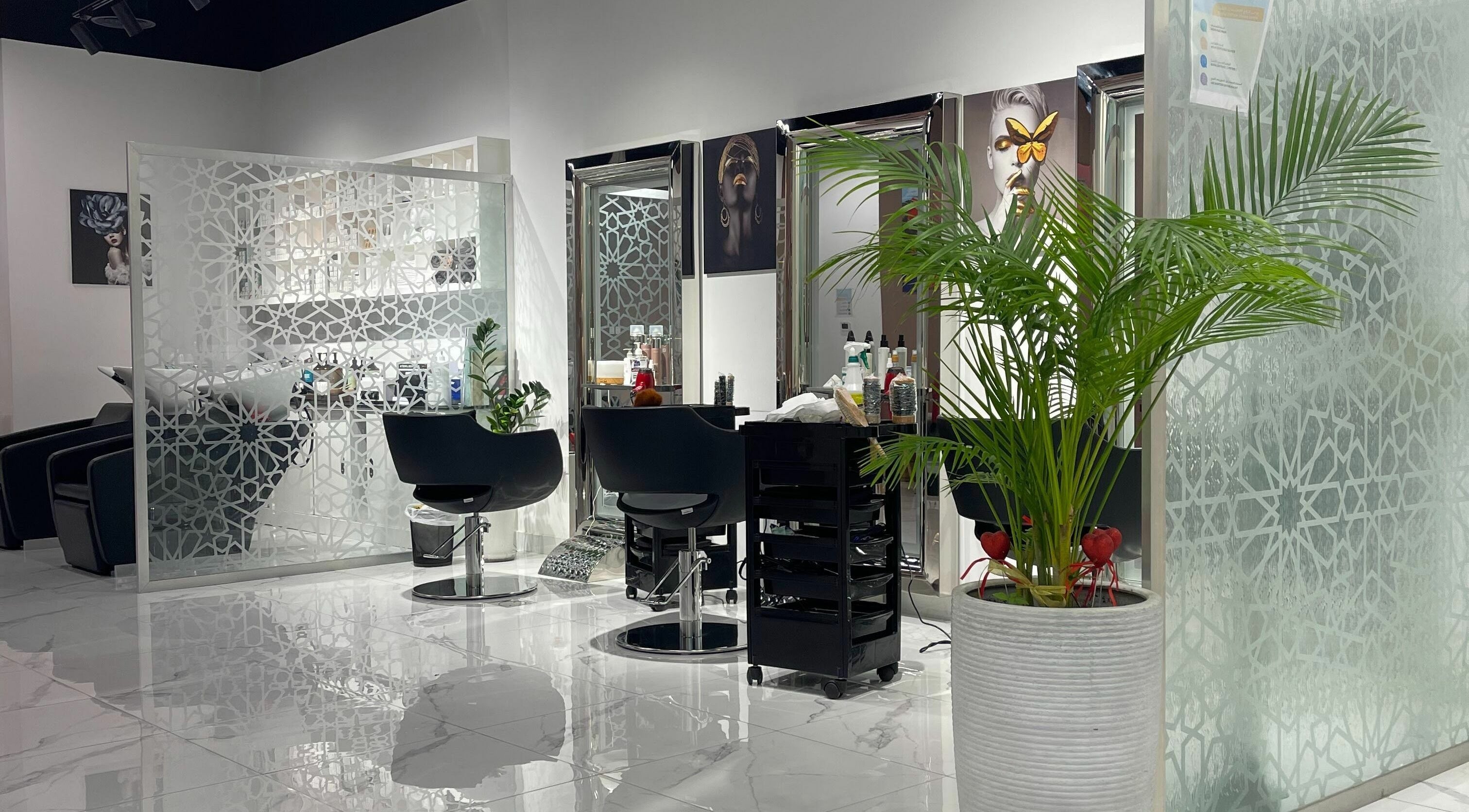 Luxurious interior of Dentelle Beauty Center and Spa, Dubai, AE with modern decor and elegant seating areas.