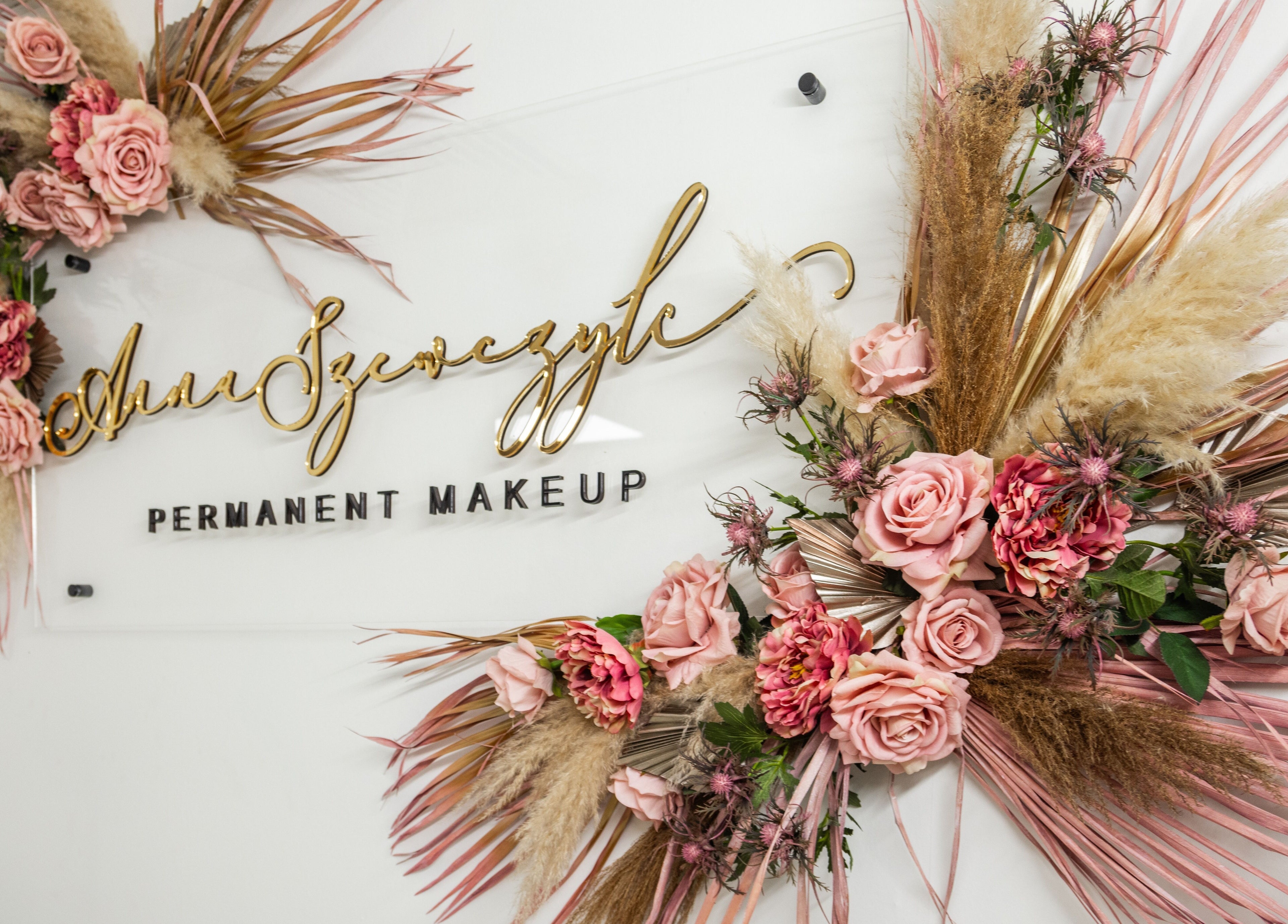 Elegant floral display on a permanent makeup sign at The Pink Room, Warrington, England, GB.