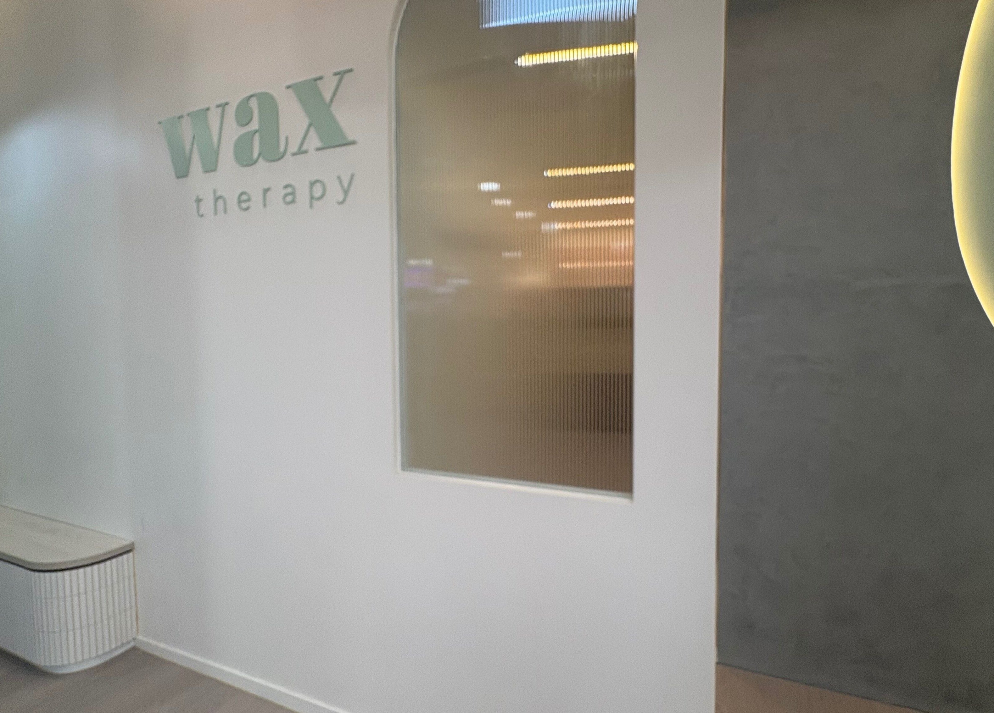 Elegant interior of Wax Therapy Hyperdome in Loganholme, Queensland, AU featuring a serene waiting area.