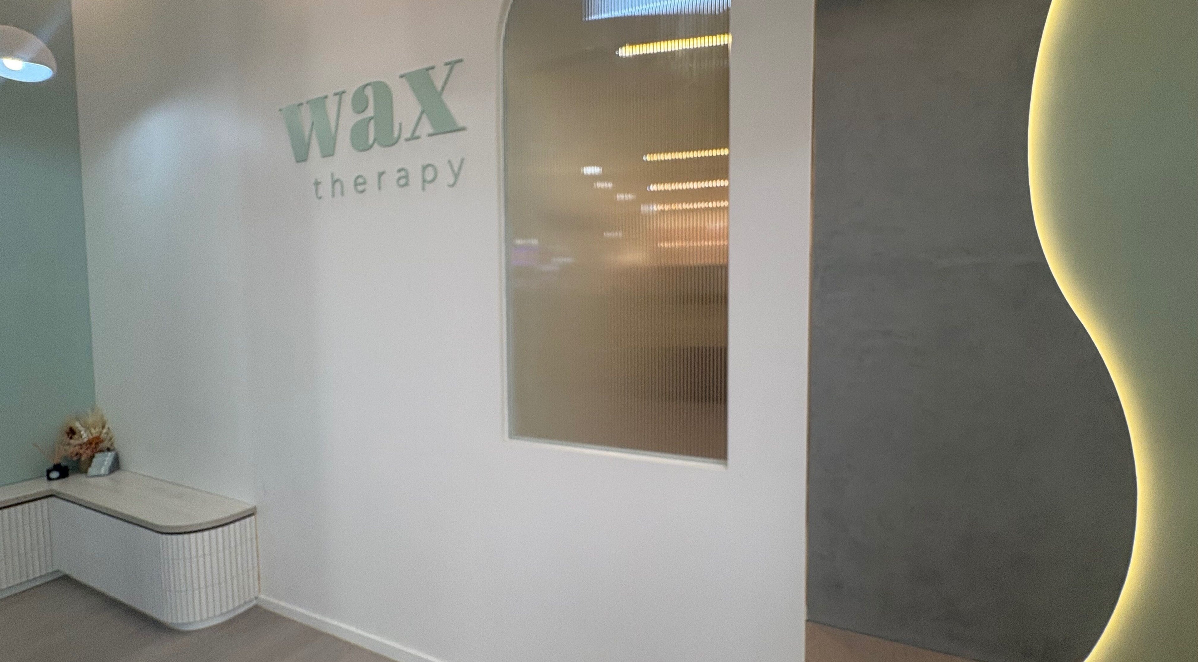 Elegant interior of Wax Therapy Hyperdome in Loganholme, Queensland, AU featuring a serene waiting area.