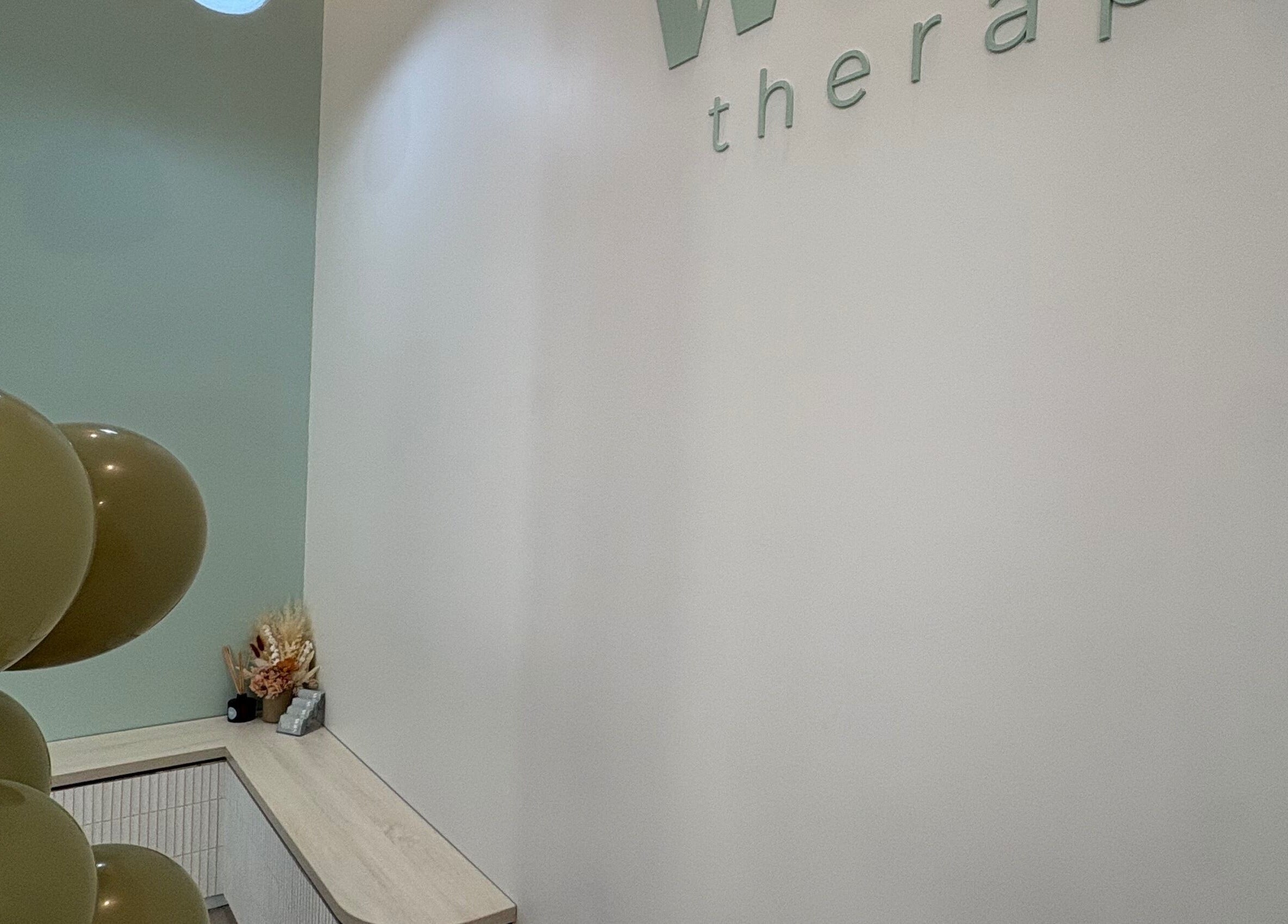 Elegant entry of Wax Therapy Hyperdome in Loganholme, Queensland, AU with soft lighting and decor.