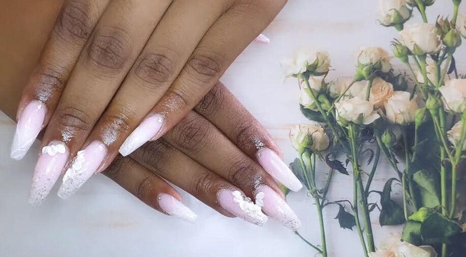 Elegant pink and white floral nails at Black Orchid Beauty Bar, Johannesburg, Gauteng, ZA.