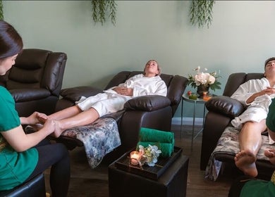 Couples enjoying foot massages at Mumsabai Therapeutic Massage Clinic Est 2008, Coogee, New South Wales, AU.
