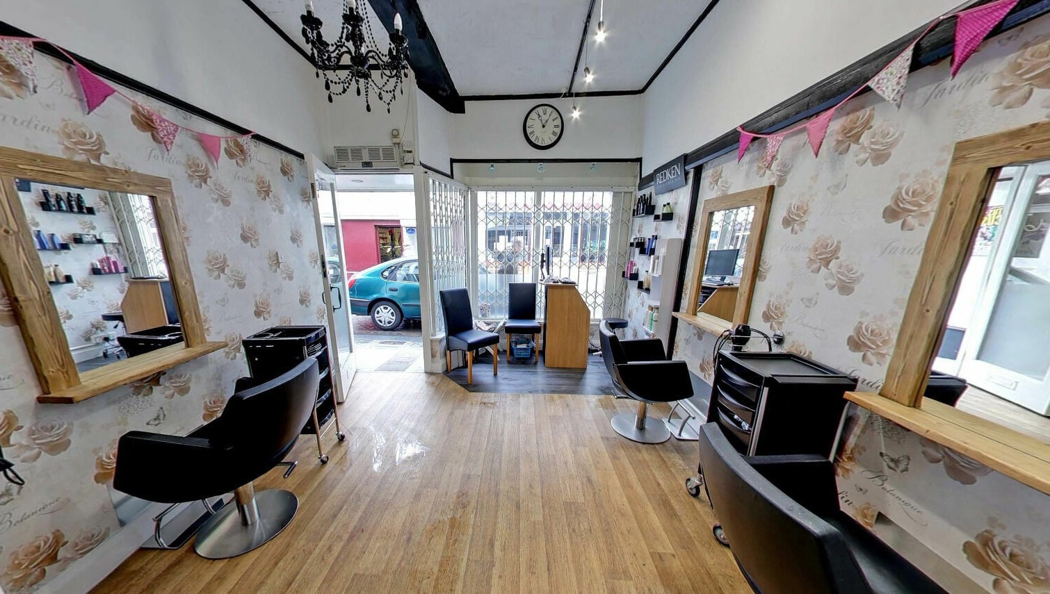 Studio 26's elegant beauty salon in Royston, England with chic décor and comfortable seating.