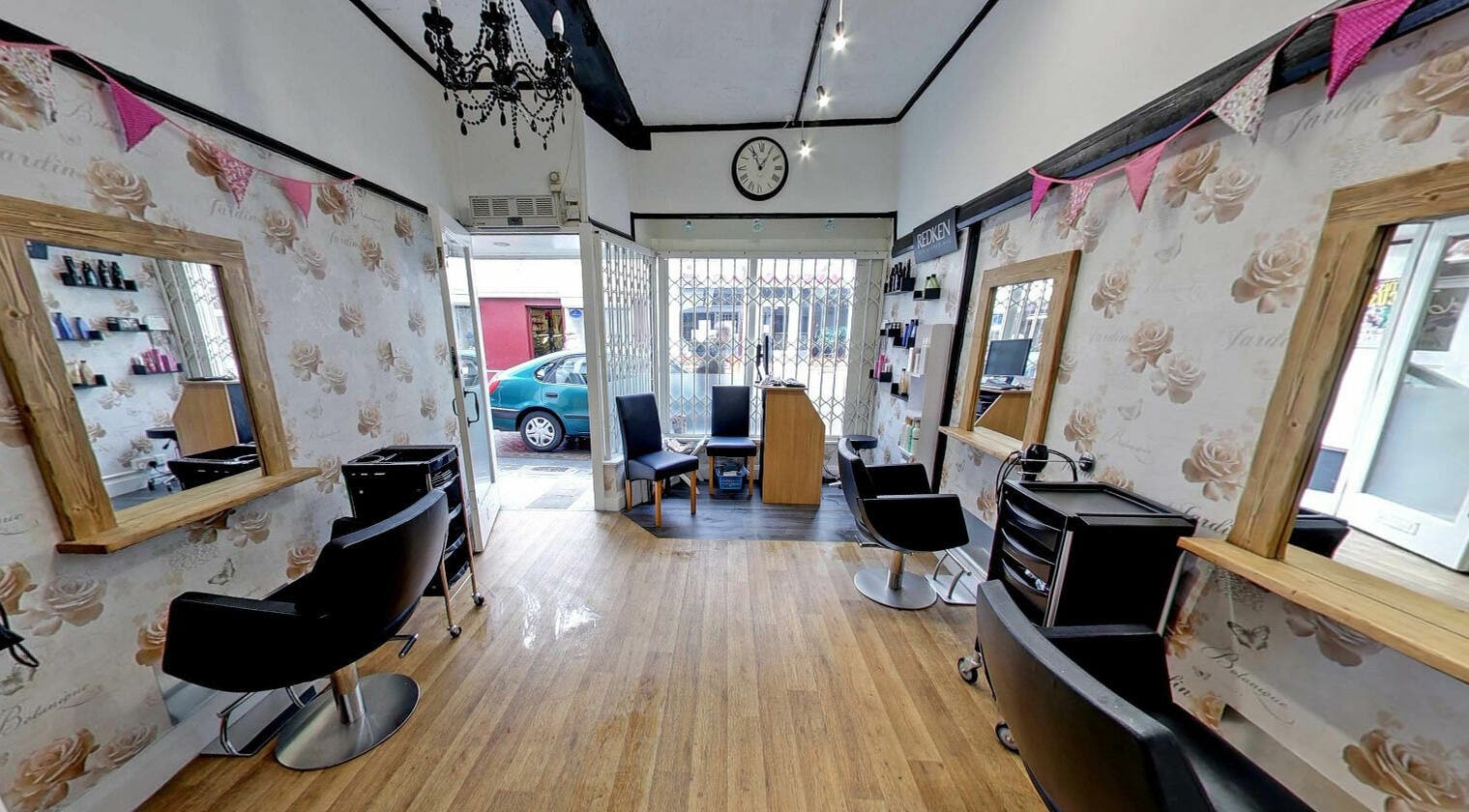 Studio 26's elegant beauty salon in Royston, England with chic décor and comfortable seating.