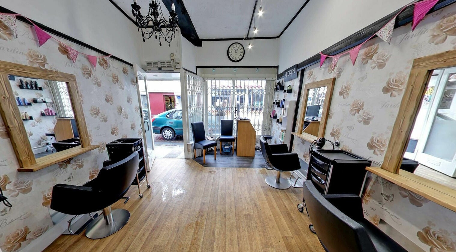 Studio 26's elegant beauty salon in Royston, England with chic décor and comfortable seating.