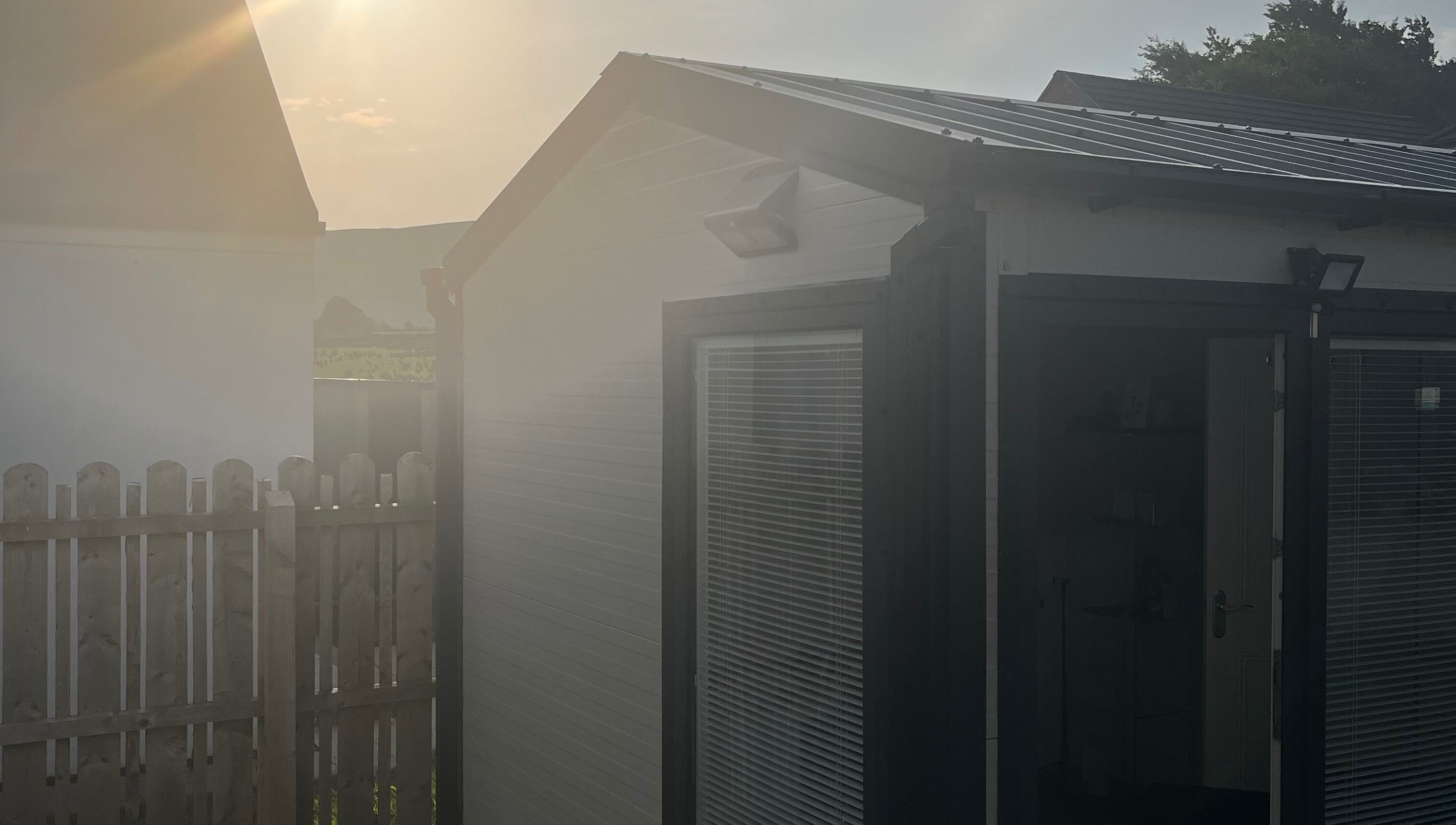 Exterior view of The Beautie Studio in Londonderry, Northern Ireland, GB, bathed in soft sunlight.