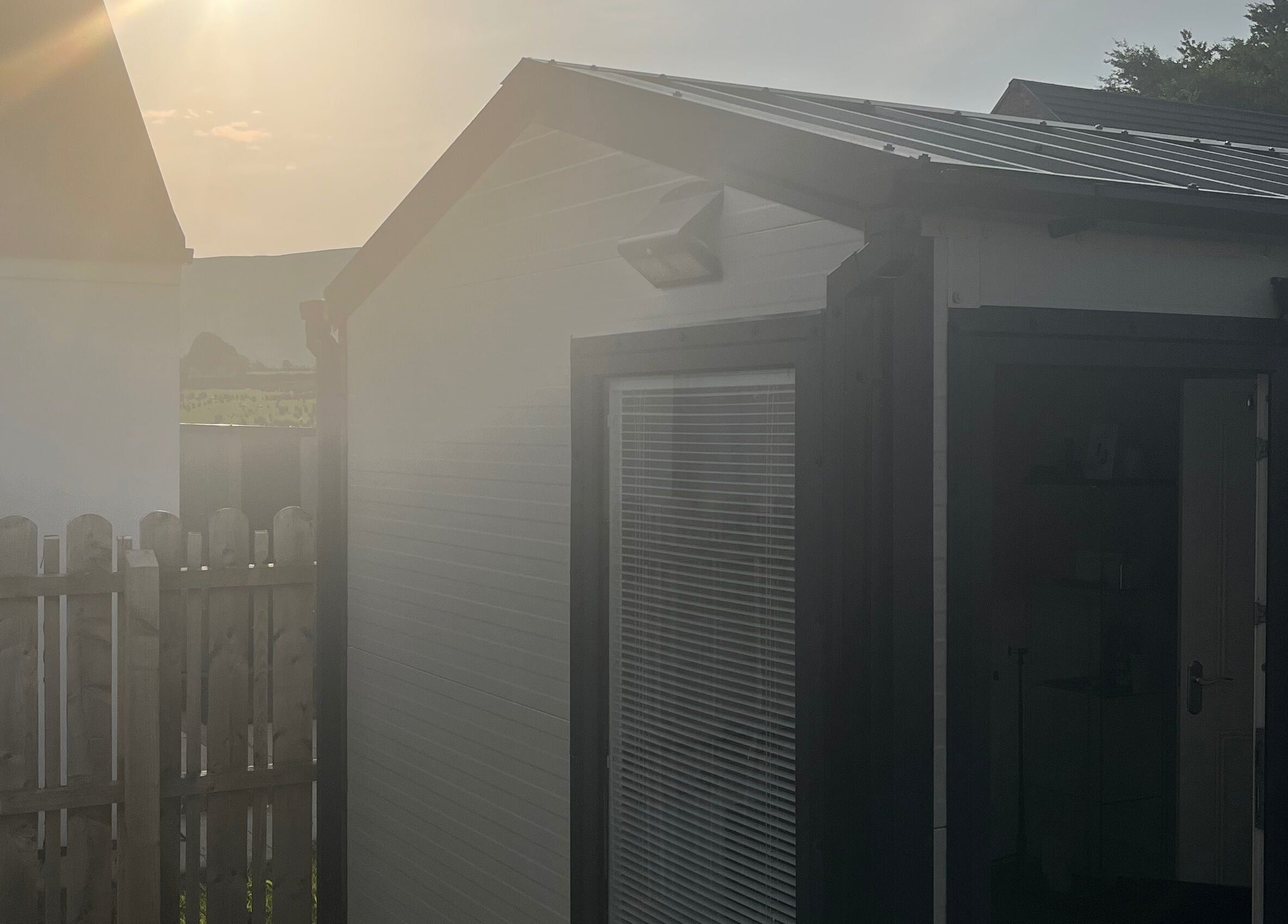 Exterior view of The Beautie Studio in Londonderry, Northern Ireland, GB, bathed in soft sunlight.