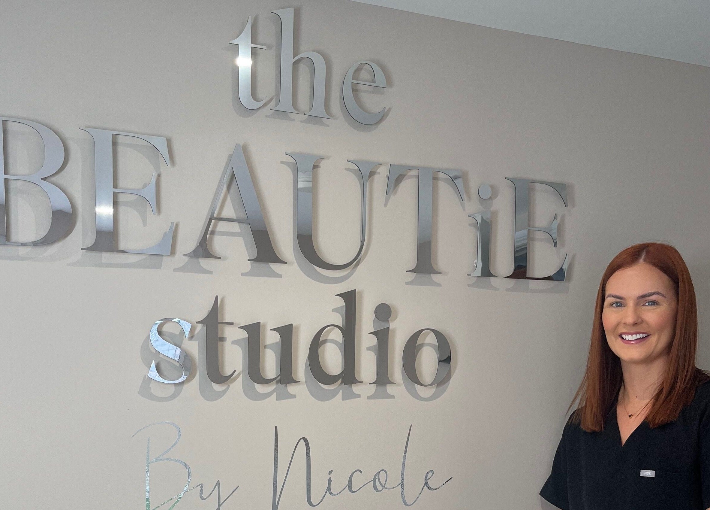 Welcome to The Beautie Studio in Londonderry, Northern Ireland, GB, featuring elegant signage and friendly staff.