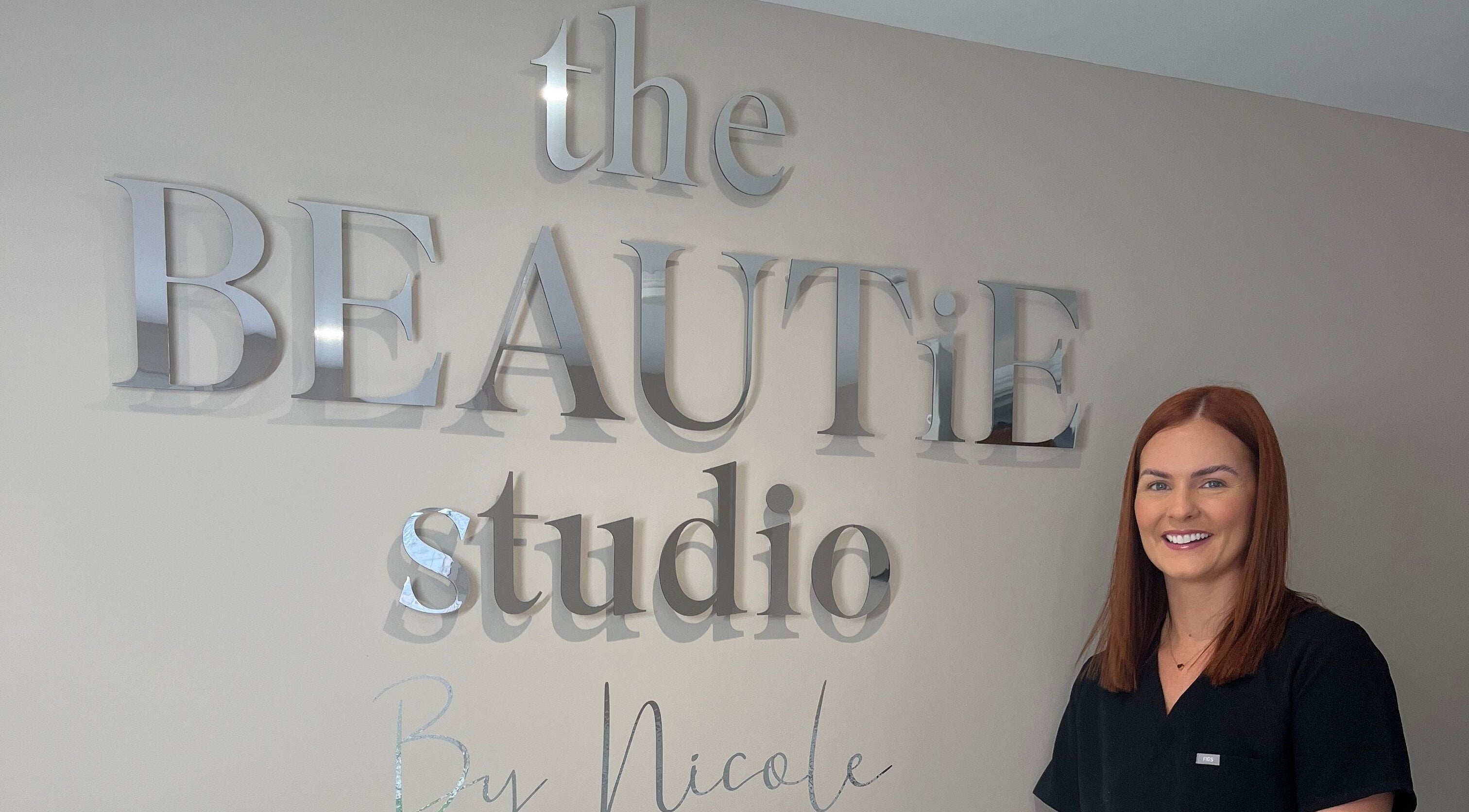 Welcome to The Beautie Studio in Londonderry, Northern Ireland, GB, featuring elegant signage and friendly staff.