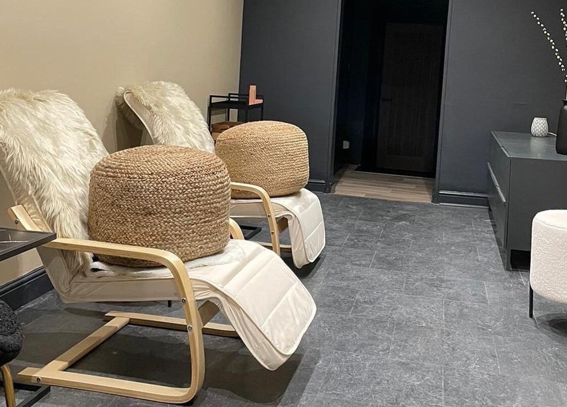 Relaxing chairs with plush cushions at Novu Harrogate, Harrogate, England, GB, embody comfort and style.