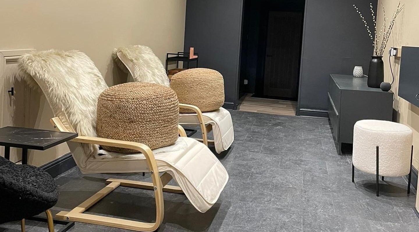 Relaxing chairs with plush cushions at Novu Harrogate, Harrogate, England, GB, embody comfort and style.