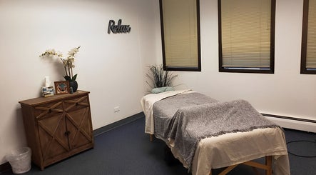 Relaxing massage room at Motion Massage - Denver, offering a tranquil escape in Denver, Colorado, US.