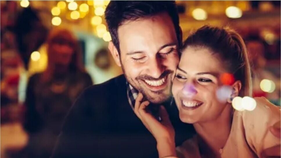 Couple enjoying Not Your Average Date Night in Wheat Ridge, Colorado, US, surrounded by warm ambient lights.
