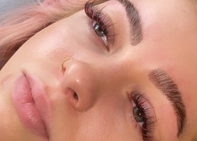 Close-up of styled brows and lashes at Lovetolashx, Rubery, England, GB, showcasing beauty enhancement.