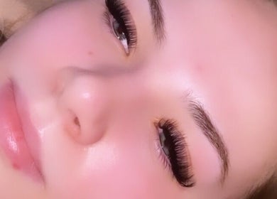 Close-up of lush eyelashes from Lovetolashx, Rubery, England, GB, showcasing expert beauty enhancement.