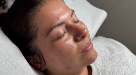 Client with radiant skin enjoying relaxation at Lovetolashx, Rubery, England, GB.