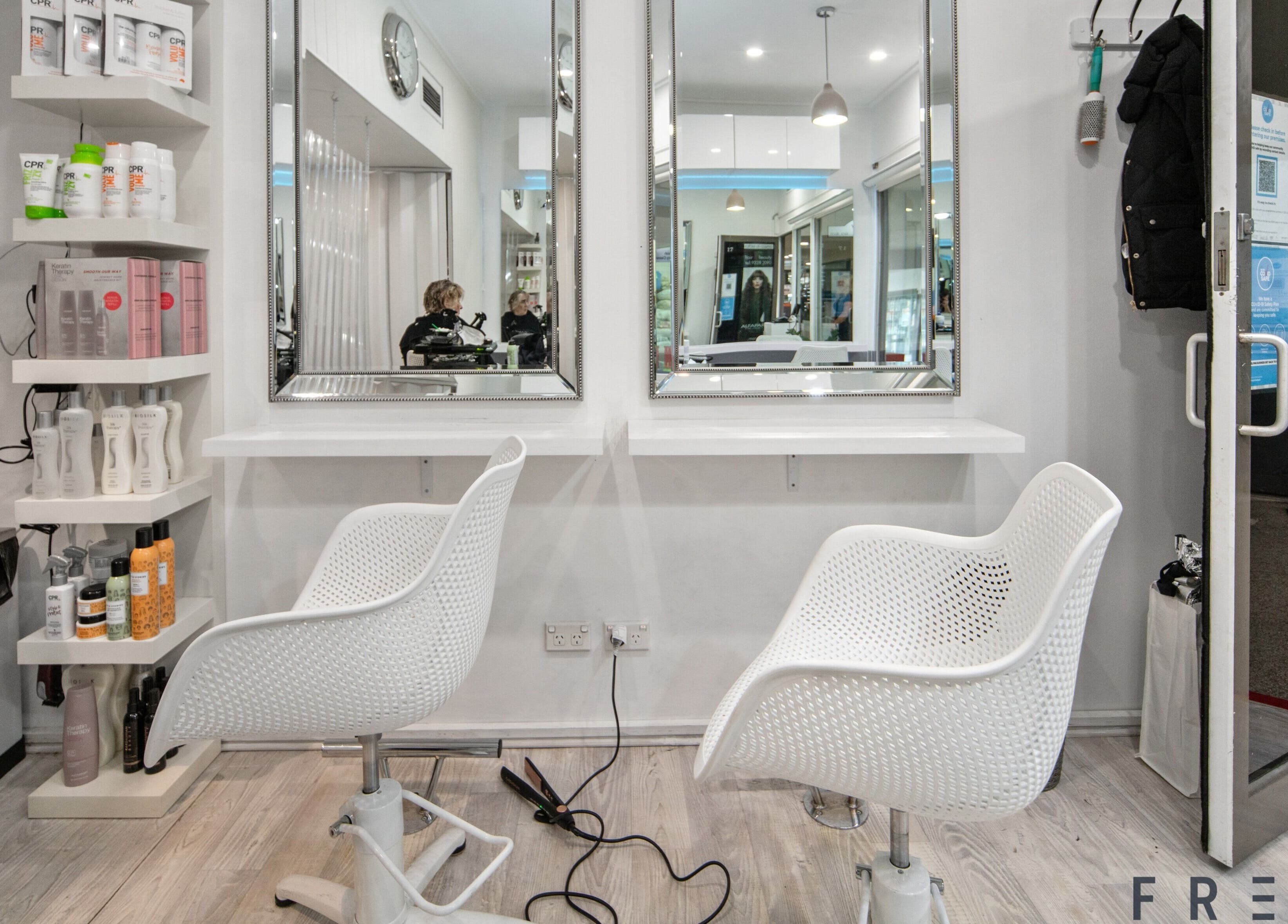 Modern salon chairs and mirrors at Rafael Salon - Double Bay, located in Double Bay, New South Wales, AU.