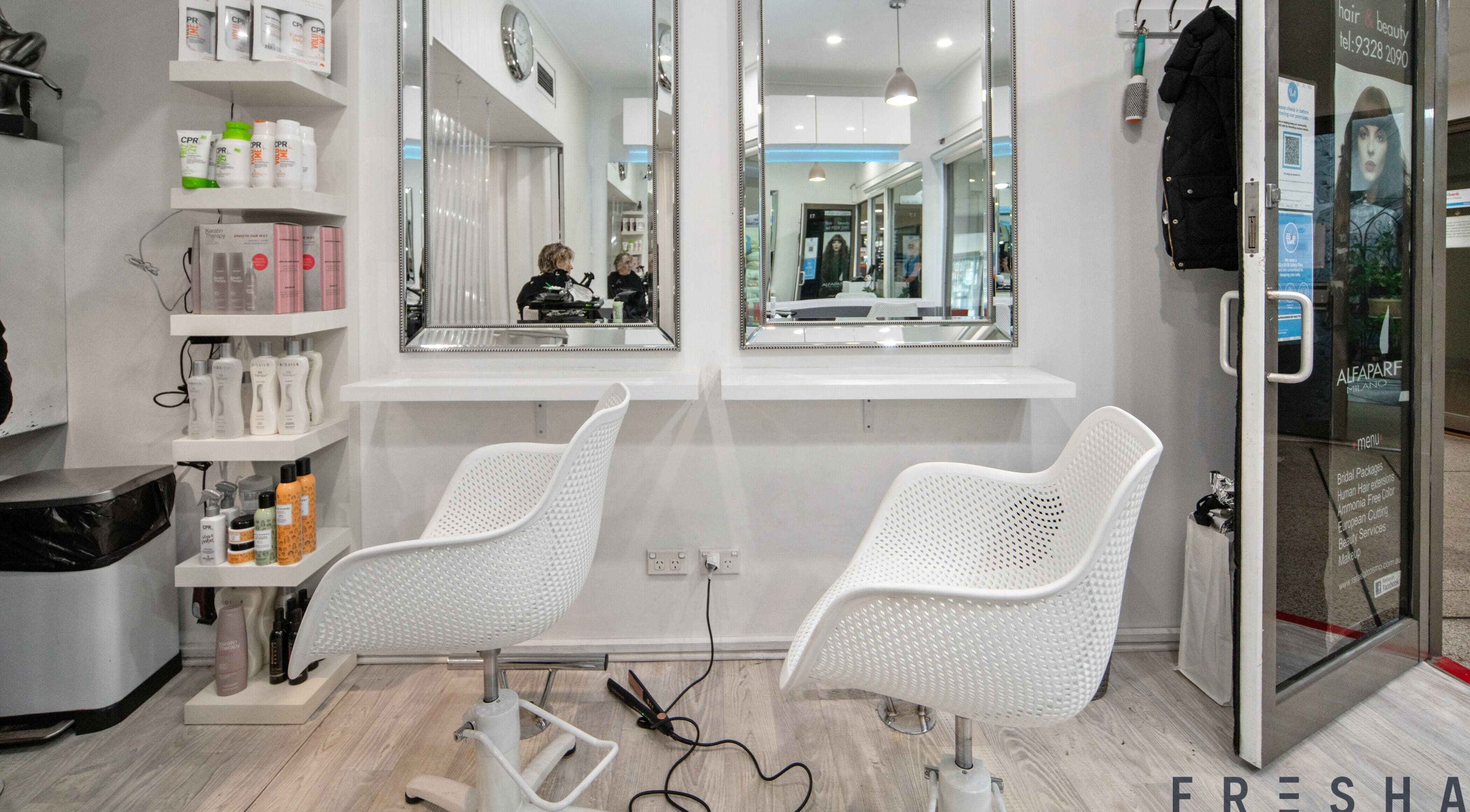 Modern salon chairs and mirrors at Rafael Salon - Double Bay, located in Double Bay, New South Wales, AU.