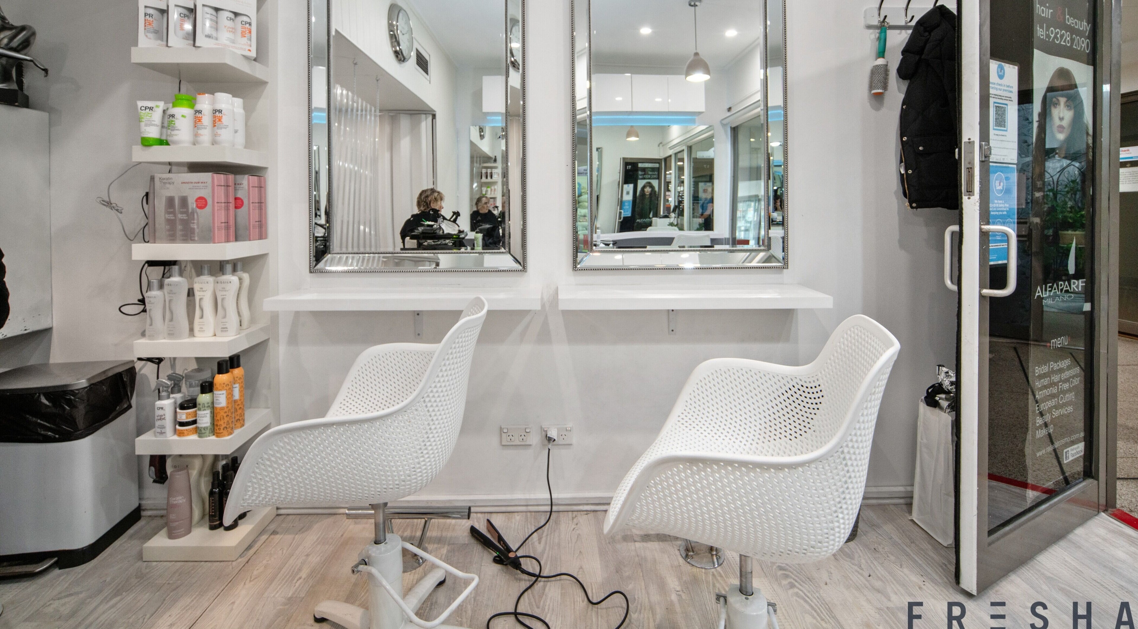 Modern salon chairs and mirrors at Rafael Salon - Double Bay, located in Double Bay, New South Wales, AU.