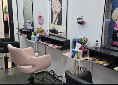 Modern salon interior with stylish chairs at Create Hair & Co, Corrimal, New South Wales, AU.