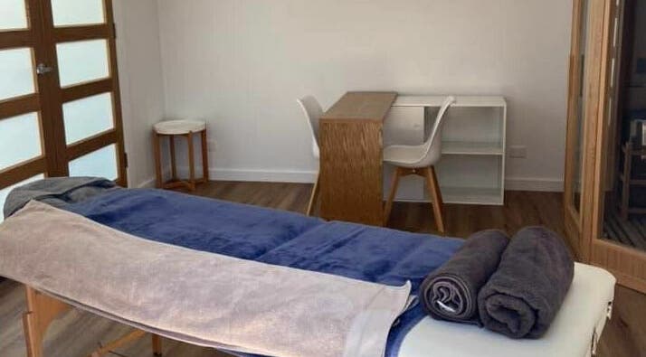 Calming massage room at The Massage Shed, Wodonga, Victoria, AU, featuring a neatly arranged massage table.