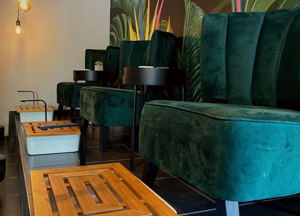 Elegant pedicure chairs in Aventus spa, Mokopane, Limpopo, ZA, with lush decor and warm lighting.