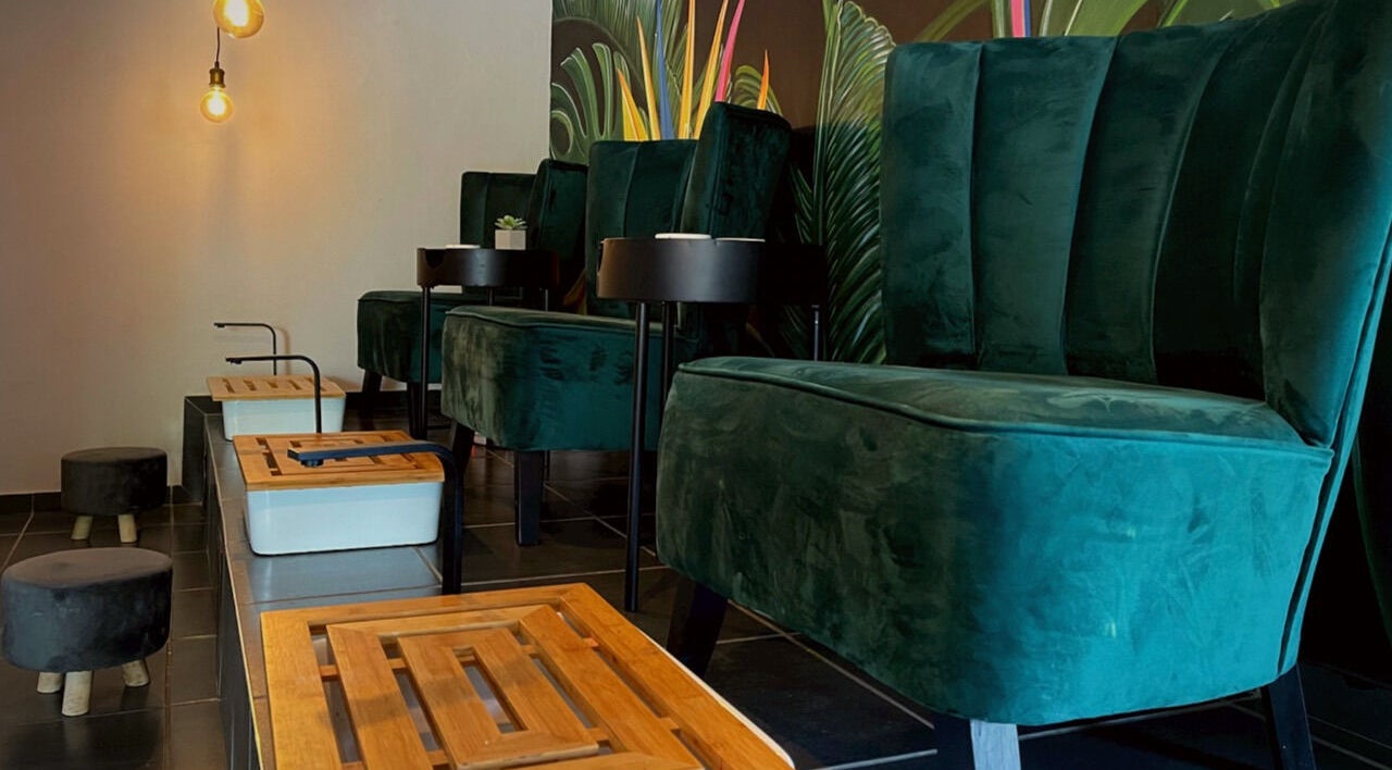 Elegant pedicure chairs in Aventus spa, Mokopane, Limpopo, ZA, with lush decor and warm lighting.