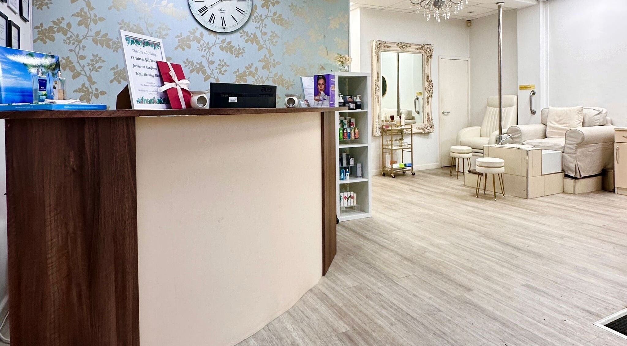 Reception and nail lounge at The Beauty Lounge Elmfield, South Croydon, England, GB with chic decor and seating.