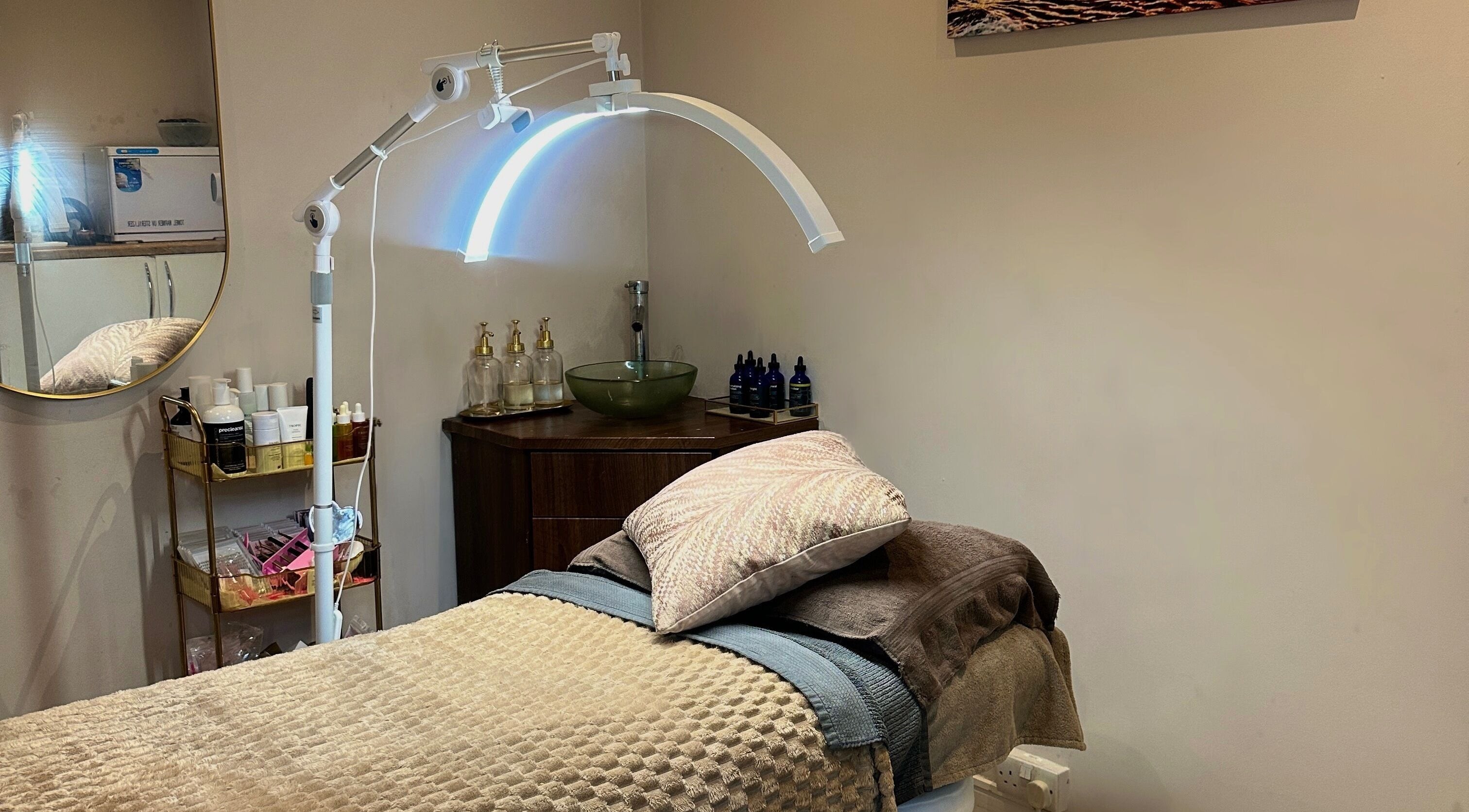 Cozy treatment bed setup at The Beauty Lounge Elmfield, South Croydon, England, GB, with elegant decor.