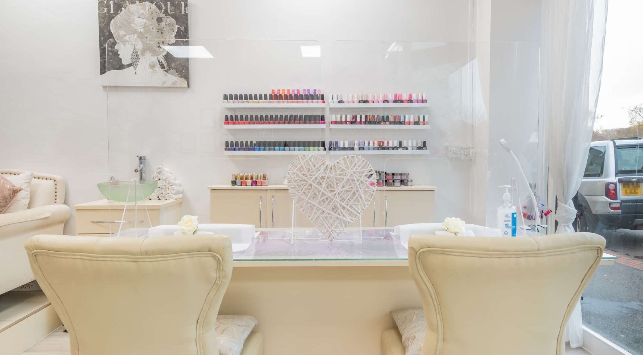 Elegant nail station at The Beauty Lounge Elmfield, South Croydon, England, GB with polish displays and cozy seating.