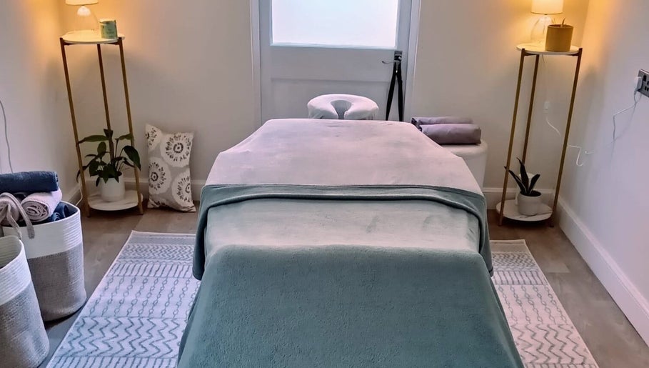 Serene massage room at Renew Massage Therapies, Ottery Saint Mary, England, GB.